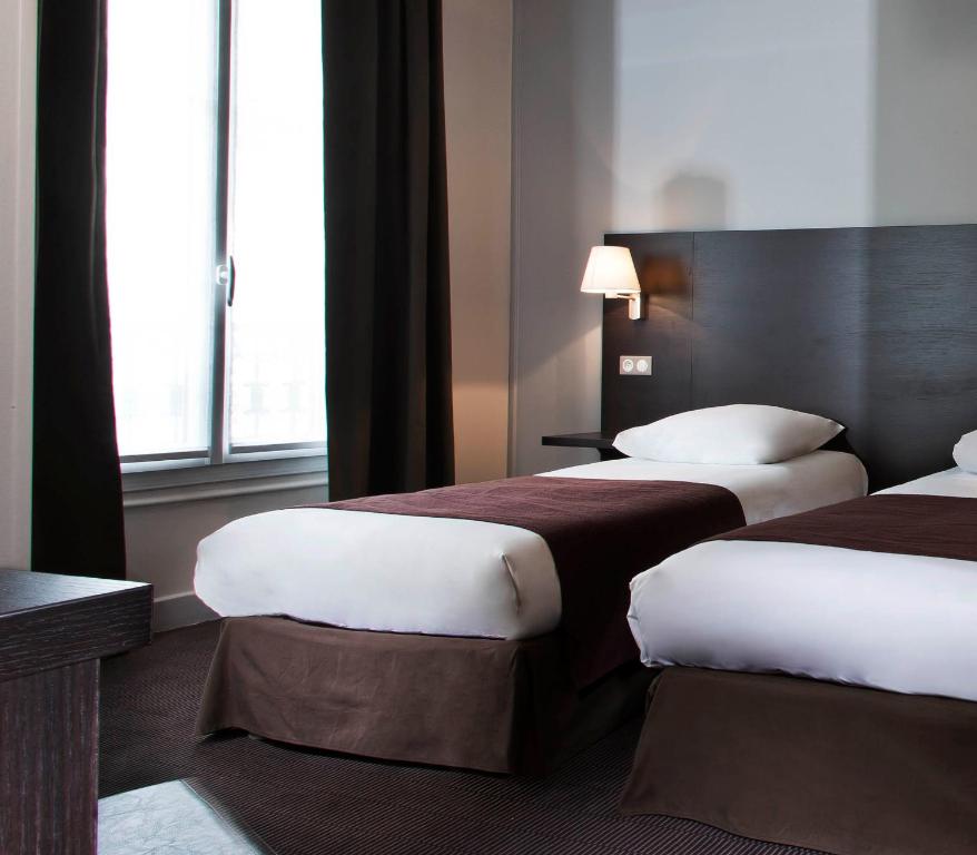 Paryż gdzie spać Hotel des Ecrivains sypialnia 2