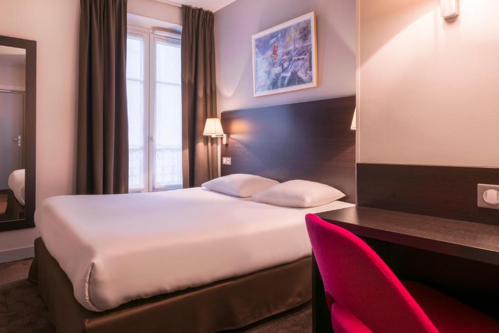 Paryż gdzie spać Hotel des Ecrivains sypialnia 