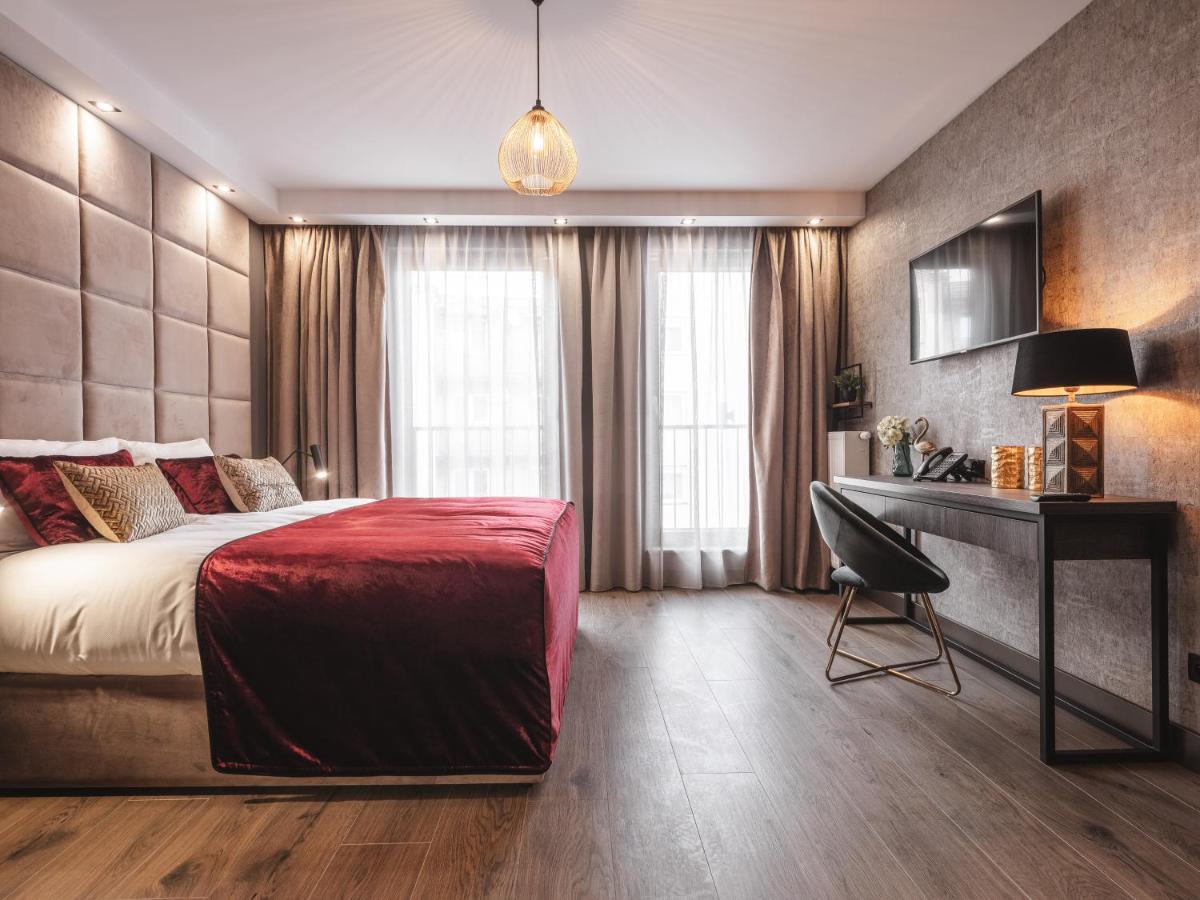 Art Suites Luxury Hotel noclegi dla dwojga Kraków sypialnia